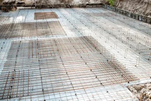 Rebar mesh tied and set on a prepared sub-base before a concrete slab pour in Bordentown, NJ